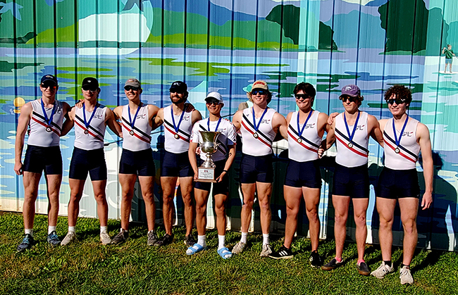 Boys varsity 1v8 with medals