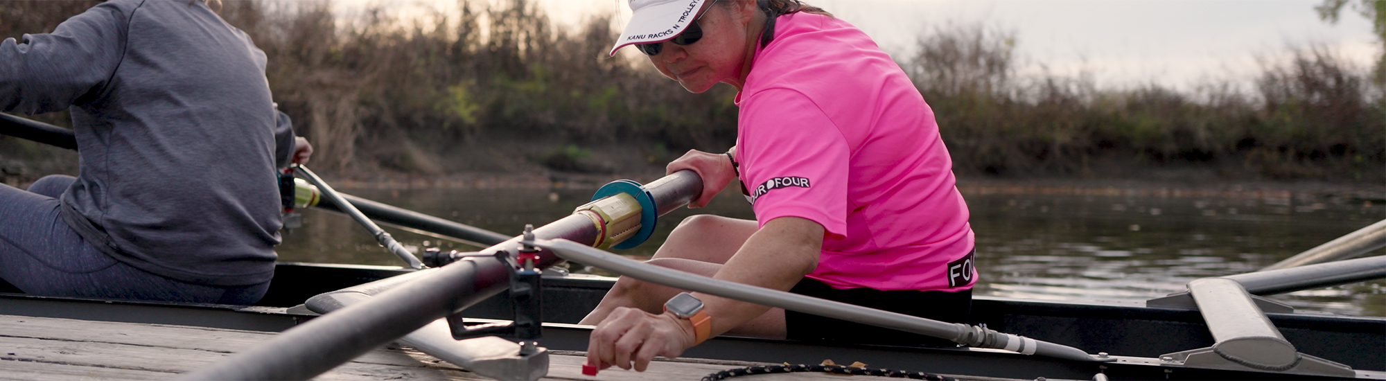 Adjusting spacer on oar at dock